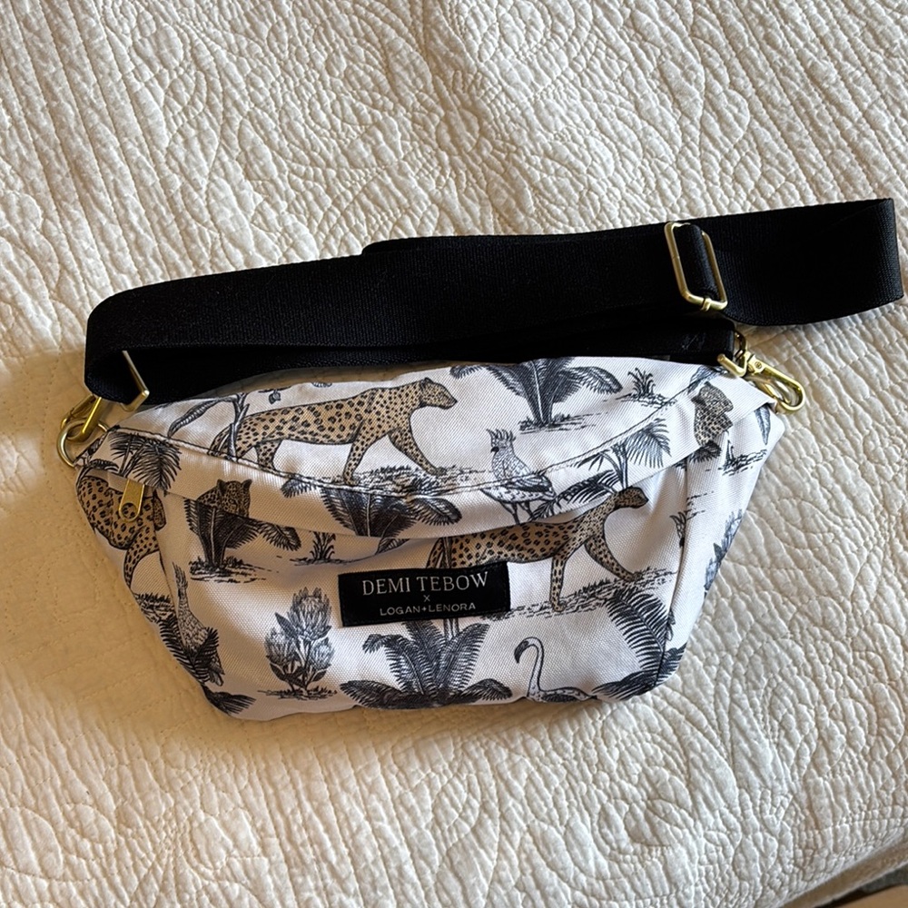 Stylish Black and White Crossbody Bag with Floral Pattern
